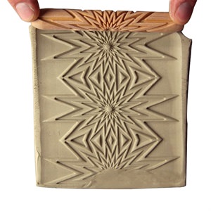 Håndrulle keramik sol sunburst mønster